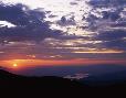 Sunrise view of Roosevelt Lake from Four Peaks. “One night I decided to camp along a four wheel drive road near the top of Four Peaks. I arose at dawn and set up the camera in anticipation of this colorful sunrise.” J.J.